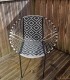 Chaise de jardin noir et blanc motifs losange